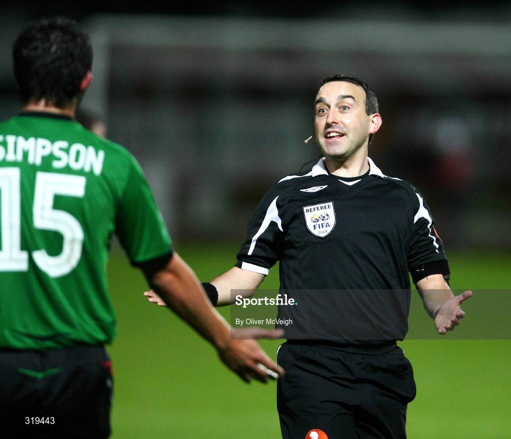 2 Septemeber 2008; Referee, Ian Stokes, in dispute with Philip Simpson, Glentoran. Setanta Cup, Derry City v Glentoran, Brandywell, Derry. Picture credit: Oliver McVeigh / SPORTSFILE