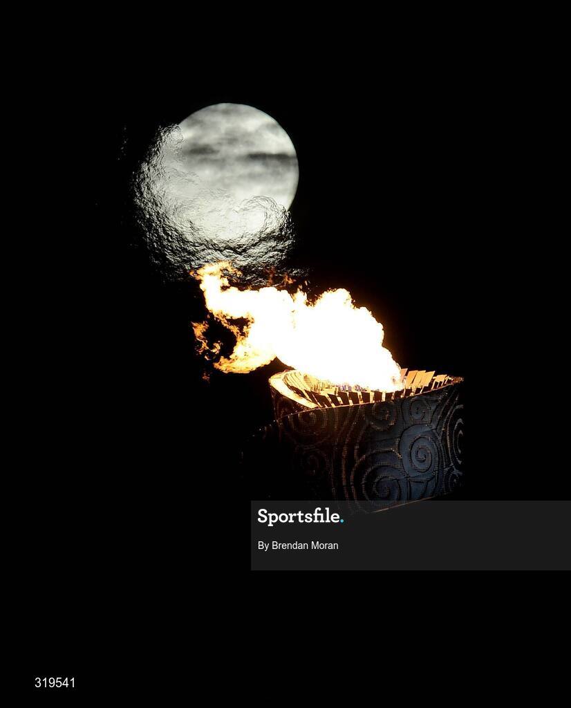 16 August 2008; The Moon is seen behind the Olympic Flame at the National Stadium. Beijing 2008 - Games of the XXIX Olympiad, National Stadium, Olympic Green, Beijing, China. Picture credit: Brendan Moran / SPORTSFILE