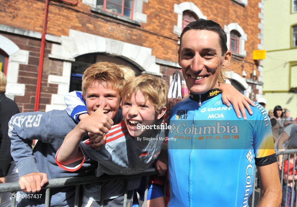 31 August 2008; A delighted Marco Pinotti, Team Columbia, poses for a picture with young fans after winning the 2008 Tour of Ireland. 2008 Tour of Ireland - Stage 5, Killarney - Cork. Picture credit: Stephen McCarthy / SPORTSFILE