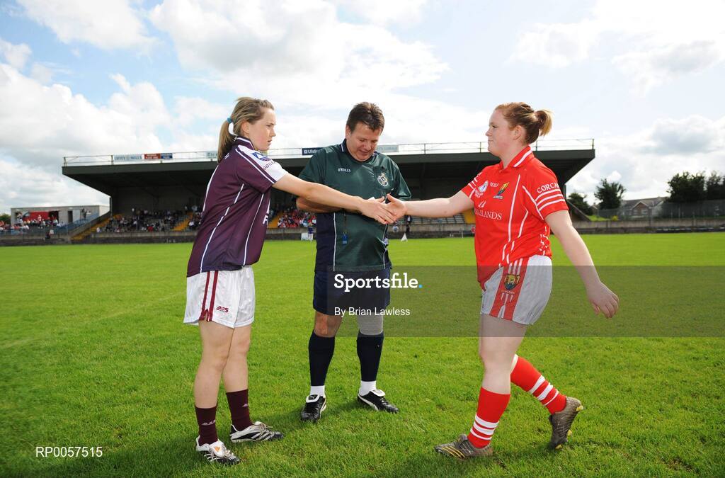 31 August 2008; Galway captain Tracey Leonard greets Cork captain Denise Cronin in the company of referee Sean McIntyre. All-Ireland Ladies U16 A Football Championship Final, Cork v Galway, McDonagh Park, Nenagh, Co. Tipperary. Picture credit: Brian Lawless / SPORTSFILE