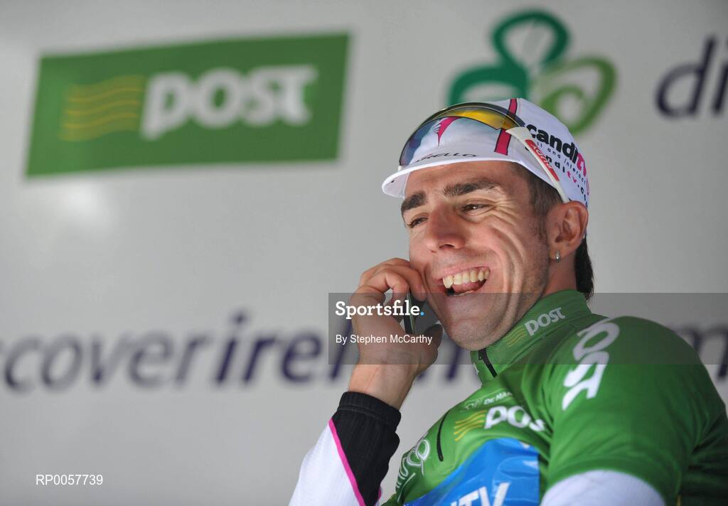 31 August 2008; Russell Downing, Pinarello CandiTV, talks on his phone after winning the An Post sponsored green jersey. 2008 Tour of Ireland - Stage 5, Killarney - Cork. Picture credit: Stephen McCarthy / SPORTSFILE  *** Local Caption ***