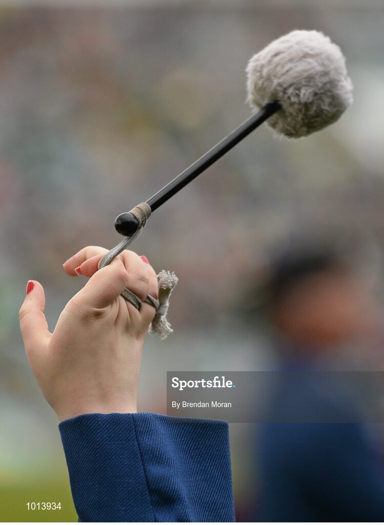 21 June 2015; A member of St Patrick's Pipe Band, Tulla, Co. Clare, twirls her drumsticks while playing before the match. Munster GAA Hurling Senior Championship, Semi-Final, Limerick v Tipperary, Gaelic Grounds, Limerick. Picture credit: Brendan Moran / SPORTSFILE