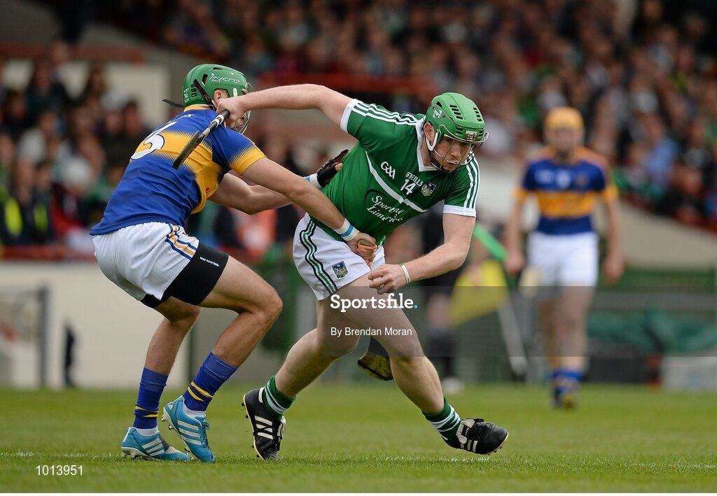 21 June 2015; Shane Dowling, Limerick, in action against James Barry, Tipperary. Munster GAA Hurling Senior Championship, Semi-Final, Limerick v Tipperary, Gaelic Grounds, Limerick. Picture credit: Brendan Moran / SPORTSFILE