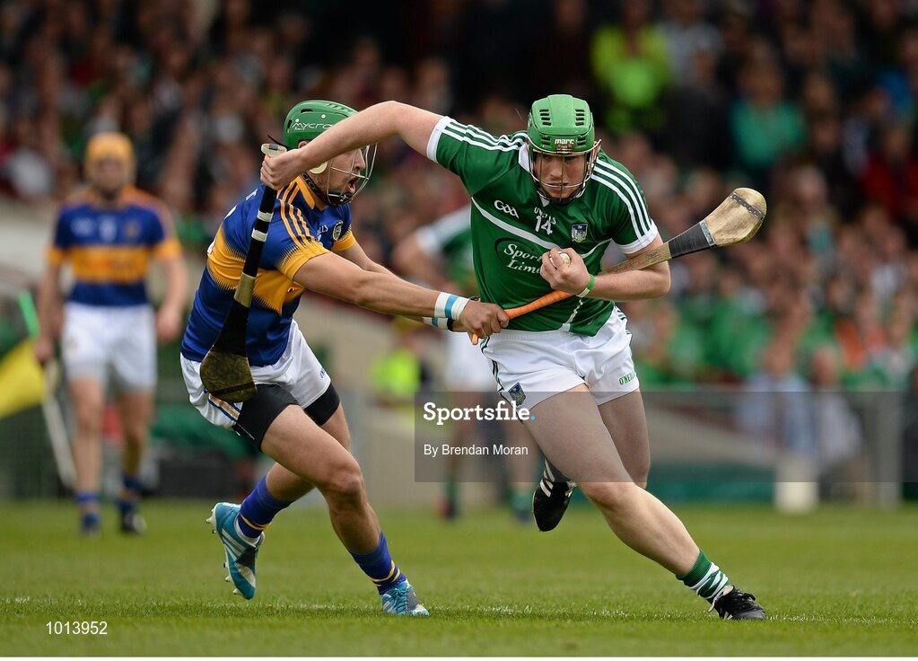 21 June 2015; Shane Dowling, Limerick, in action against James Barry, Tipperary. Munster GAA Hurling Senior Championship, Semi-Final, Limerick v Tipperary, Gaelic Grounds, Limerick. Picture credit: Brendan Moran / SPORTSFILE