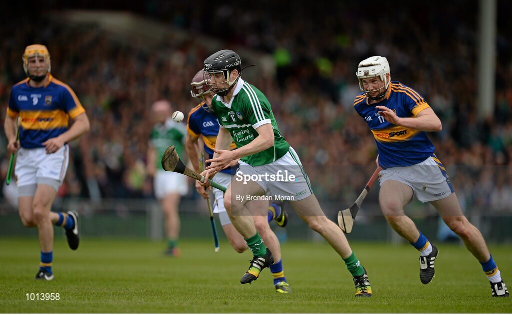 21 June 2015; Graeme Mulcahy, Limerick, in action against Shane McGrath, Paddy Stapleton and Brendan Maher, Tipperary. Munster GAA Hurling Senior Championship, Semi-Final, Limerick v Tipperary, Gaelic Grounds, Limerick. Picture credit: Brendan Moran / SPORTSFILE