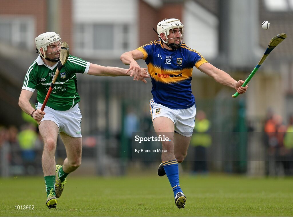 21 June 2015; Patrick Maher, Tipperary, in action against Tom Condon, Limerick. Munster GAA Hurling Senior Championship, Semi-Final, Limerick v Tipperary, Gaelic Grounds, Limerick. Picture credit: Brendan Moran / SPORTSFILE