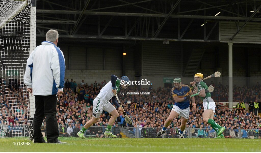 21 June 2015; Limerick goalkeeper Barry Hennessy controls the sliotar ahead of John O'Dwyer, Tipperary, and Seamus Hickey, Limerick. Munster GAA Hurling Senior Championship, Semi-Final, Limerick v Tipperary, Gaelic Grounds, Limerick. Picture credit: Brendan Moran / SPORTSFILE