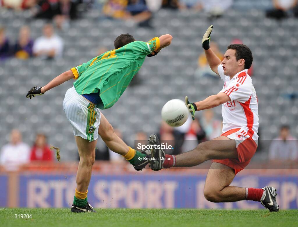 31 August 2008; Paddy Gilsenan, Meath, has his shot blocked by Martin Rogers, Tyrone. Referee Michael Meade subsequently awarded a penalty to Meath for this tackle. ESB GAA Football All-Ireland Minor Championship Semi-Final, Meath v Tyrone, Croke Park, Dublin. Picture credit: Brendan Moran / SPORTSFILE