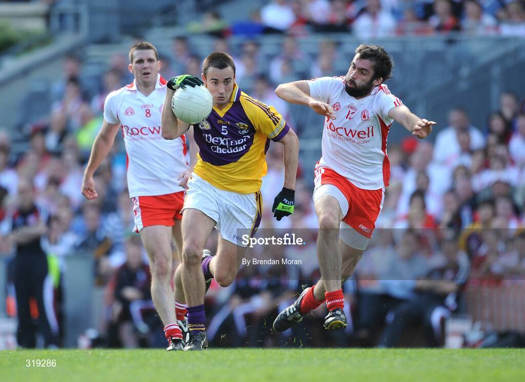 31 August 2008; Adrian Morrissey, Wexford, in action against Joe McMahon, Tyrone. GAA Football All-Ireland Senior Championship Semi-Final, Tyrone v Wexford, Croke Park, Dublin. Picture credit: Brendan Moran / SPORTSFILE