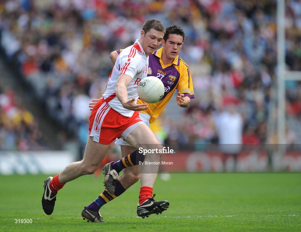 31 August 2008; Enda McGinley, Tyrone, in action against Shane Roche, Wexford. GAA Football All-Ireland Senior Championship Semi-Final, Tyrone v Wexford, Croke Park, Dublin. Picture credit: Brendan Moran / SPORTSFILE