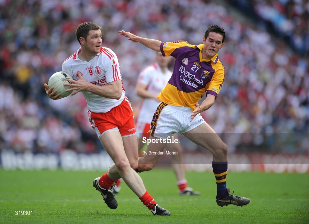 31 August 2008; Enda McGinley, Tyrone, in action against Shane Roche, Wexford. GAA Football All-Ireland Senior Championship Semi-Final, Tyrone v Wexford, Croke Park, Dublin. Picture credit: Brendan Moran / SPORTSFILE