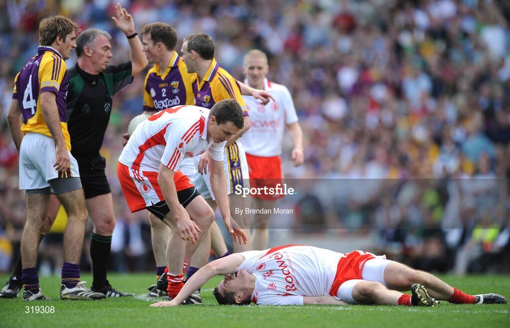 31 August 2008; An injured Sean Cavanagh, Tyrone, lies injured after a heavy challenge. GAA Football All-Ireland Senior Championship Semi-Final, Tyrone v Wexford, Croke Park, Dublin. Picture credit: Brendan Moran / SPORTSFILE