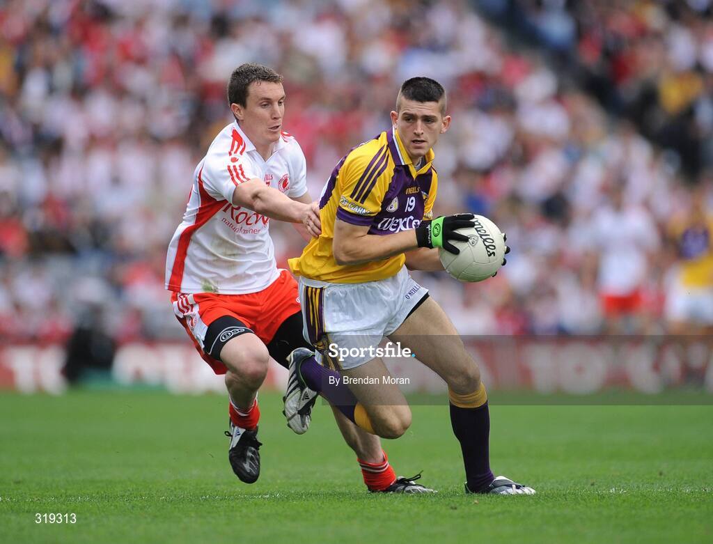 31 August 2008; Adrian Flynn, Wexford, in action against Tommy McGuigan, Tyrone. GAA Football All-Ireland Senior Championship Semi-Final, Tyrone v Wexford, Croke Park, Dublin. Picture credit: Brendan Moran / SPORTSFILE