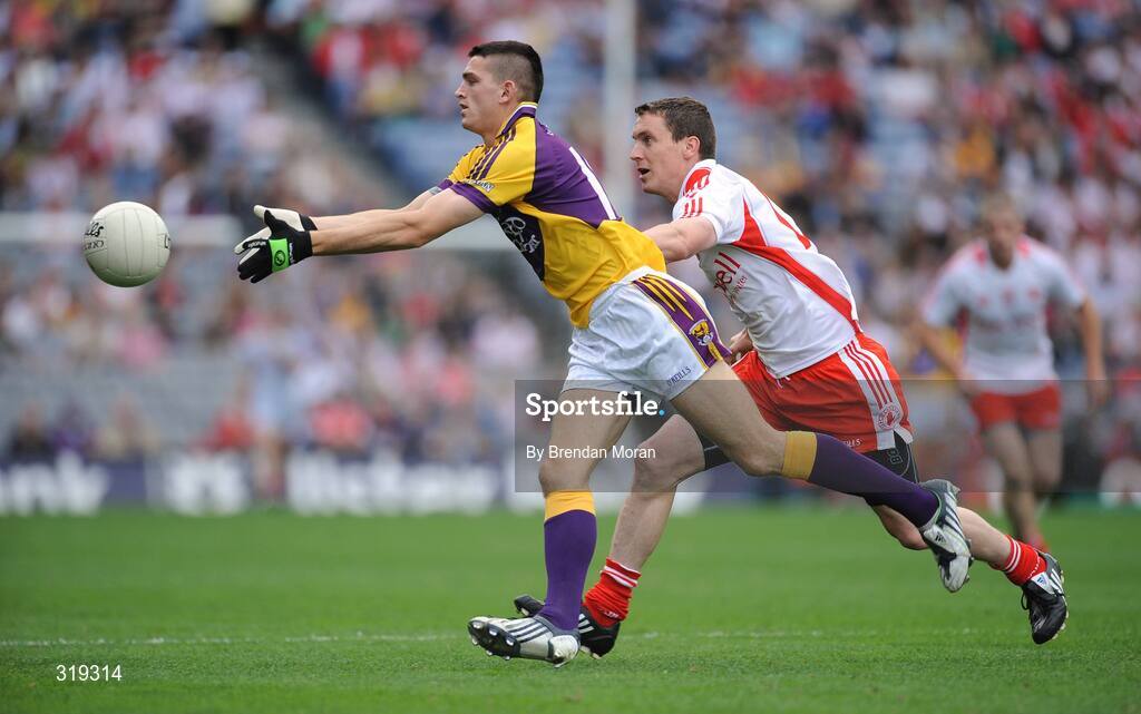 31 August 2008; Adrian Flynn, Wexford, in action against Tommy McGuigan, Tyrone. GAA Football All-Ireland Senior Championship Semi-Final, Tyrone v Wexford, Croke Park, Dublin. Picture credit: Brendan Moran / SPORTSFILE
