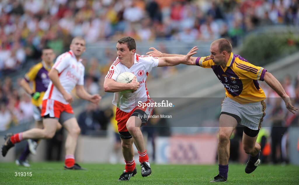 31 August 2008; Tommy McGuigan, Tyrone, in action against Philip Wallace, Wexford. GAA Football All-Ireland Senior Championship Semi-Final, Tyrone v Wexford, Croke Park, Dublin. Picture credit: Brendan Moran / SPORTSFILE