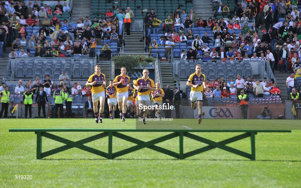31 August 2008; The Wexford team make their way to the bench for the team photograph. GAA Football All-Ireland Senior Championship Semi-Final, Tyrone v Wexford, Croke Park, Dublin. Picture credit: Brendan Moran / SPORTSFILE