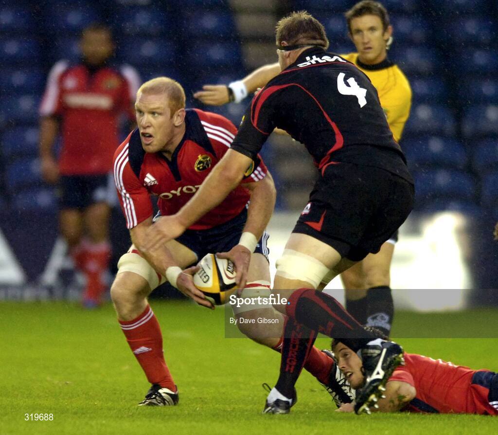 5 September 2008; Paul O'Connell, Munster, gets his pass away despite pressure from Craig Hamilton, Edinburgh. Magners League, Edinburgh v Munster, Murrayfield Stadium, Edinburgh, Scotland. Picture credit: Dave Gibson / SPORTSFILE