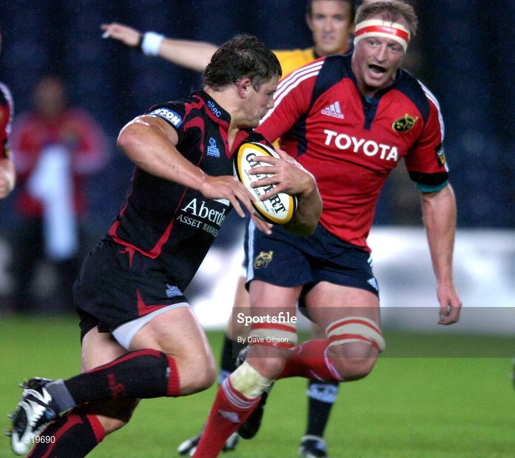 5 September 2008; Ross Ford, Edinburgh, is put under pressure by Mick O'Driscoll, Munster. Magners League, Edinburgh v Munster, Murrayfield Stadium, Edinburgh, Scotland. Picture credit: Dave Gibson / SPORTSFILE