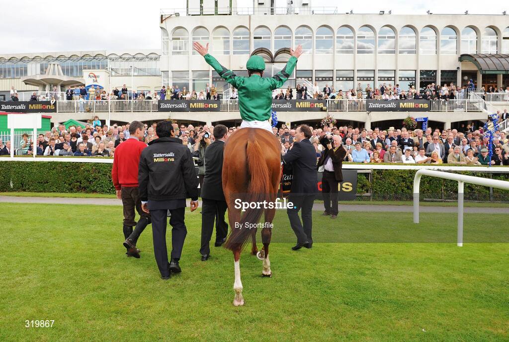7 September 2008; Jockey Kevin Manning, aboard New Approach, salutes the crowd after winning the Tattersalls Millions Irish Champion Stakes. Horse Racing, Leopardstown, Dublin. Photo by Sportsfile