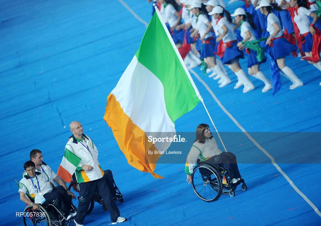 6 September 2008; Flag bearer Patrice Dockery, from Swords, Dublin, who competes in the Wheelchair 100m, 200m, & 400m, and Chef de  Mission Jimmy Byrne, lead the Ireland team out during the Opening Ceremony of the Beijing Paralympic Games 2008, National Stadium, Olympic Green, Beijing, China. Picture credit: Brian Lawless / SPORTSFILE