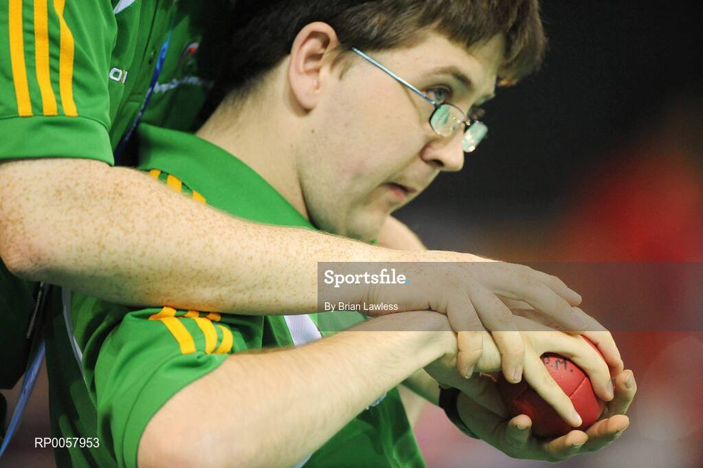 7 September 2008; Padraic Moran, from Bray, Co. Wicklow, receives assistance during his opening pool match of the Individual Boccia competition against David Smith of Great Britain. Padraic won his match 9-0. Beijing Paralympic Games 2008, Mixed Individual Boccia BC1, Pool B, Fencing Hall of National Convention Centre, Olympic Green, Beijing, China. Picture credit: Brian Lawless / SPORTSFILE