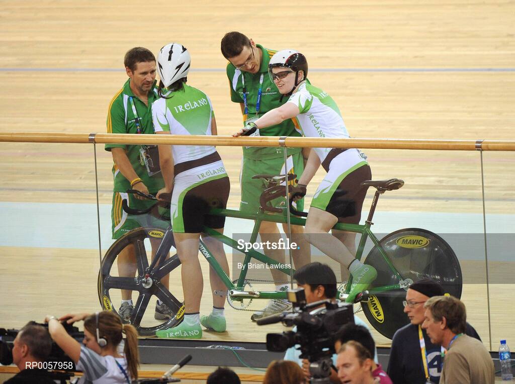 7 September 2008; Catherine Walsh, from Swords, Dublin, right, and sighted pilot rider Joanna Hickey, from Rathfarnham, Dublin, are greeted by team manager Denis Toomey, from Mitchelstown, Co. Cork, left, and Coach Brian Nugent, from Cookstown, Dublin, after setting a new Irish National record during the 1km Time Trial Final (B&VI 1-3 class) in a time of 1:16.208. The duo finished in 7th position overall. Beijing Paralympic Games 2008, Women's 1km Time Trial (B&VI 1-3), Laoshan Velodrome, Shijingshan District, Beijing, China. Picture credit: Brian Lawless / SPORTSFILE