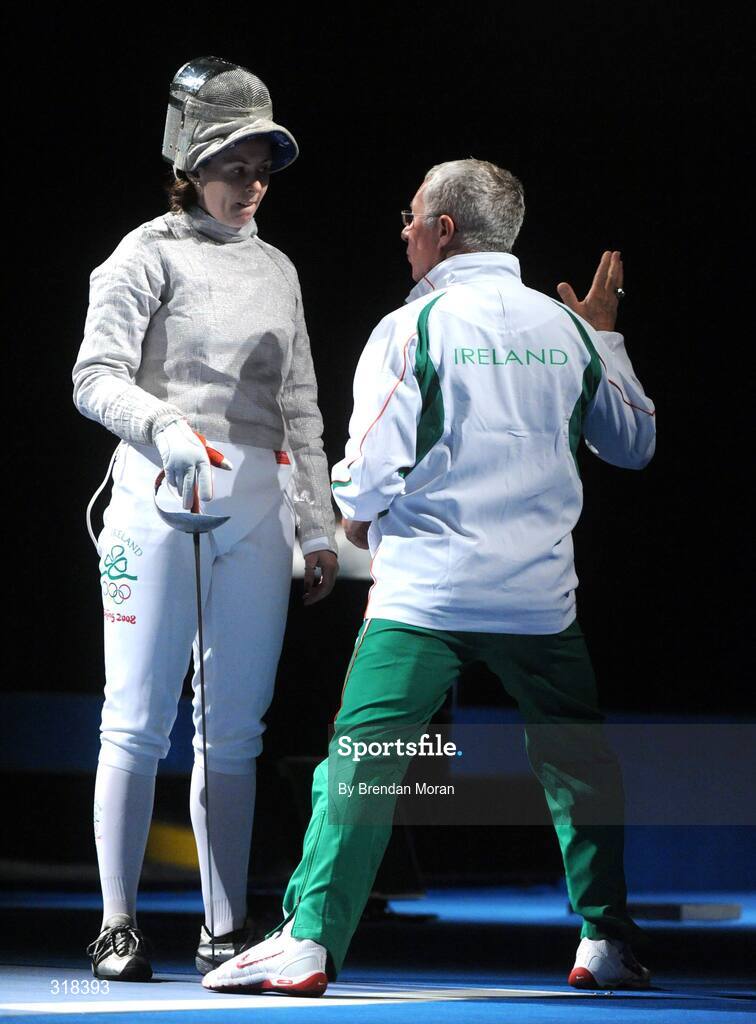 9 August 2008; Siobhan Byrne, Ireland, is spoken to by her coach Vladimir Nazlymov during her bout against Irena Wieckowska, Poland. where she lost 15-8. Beijing 2008 - Games of the XXIX Olympiad, Fencing Hall of National Convention Centre, Olympic Green, Beijing, China. Picture credit: Brendan Moran / SPORTSFILE