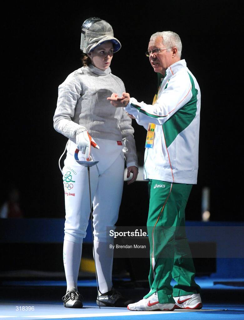 9 August 2008; Siobhan Byrne, Ireland, is spoken to by her coach Vladimir Nazlymov during her bout against Irena Wieckowska, Poland. where she lost 15-8. Beijing 2008 - Games of the XXIX Olympiad, Fencing Hall of National Convention Centre, Olympic Green, Beijing, China. Picture credit: Brendan Moran / SPORTSFILE