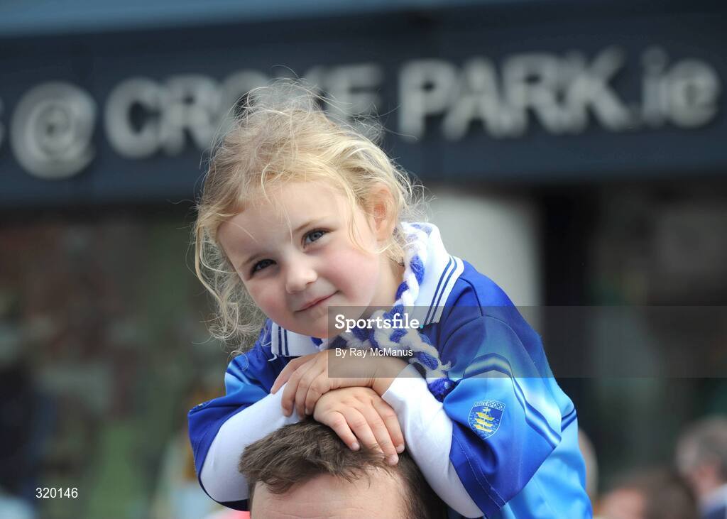 7 September 2008; Four-year-old Kate Melay, from The Grange, Co. Waterford, rests on her dad Micheal's head as they make their way to the game. GAA Hurling All-Ireland Senior Championship Final, Kilkenny v Waterford, Croke Park, Dublin. Picture credit: Ray McManus / SPORTSFILE