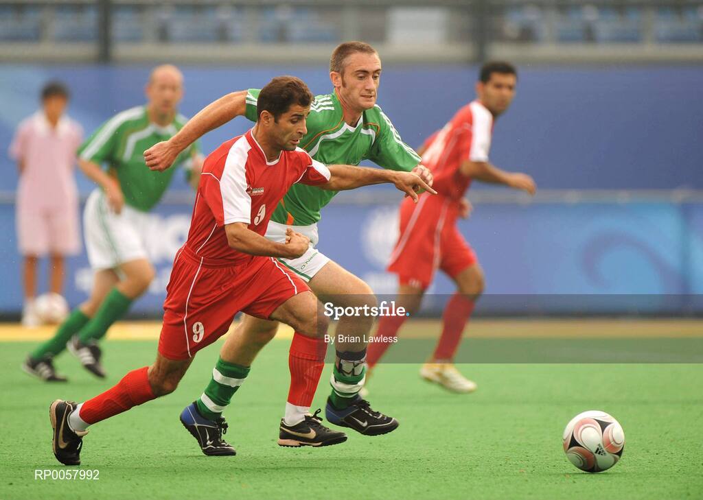 8 September 2008; Ireland's Derek Malone, from Whitegate, Co. Clare, in action against Morteza Heidari, Iran. Beijing Paralympic Games 2008, Ireland v Iran, 7-A-Side Soccer, First Round, Group B, Olympic Green Hockey Field A, Beijing, China. Picture credit: Brian Lawless / SPORTSFILE