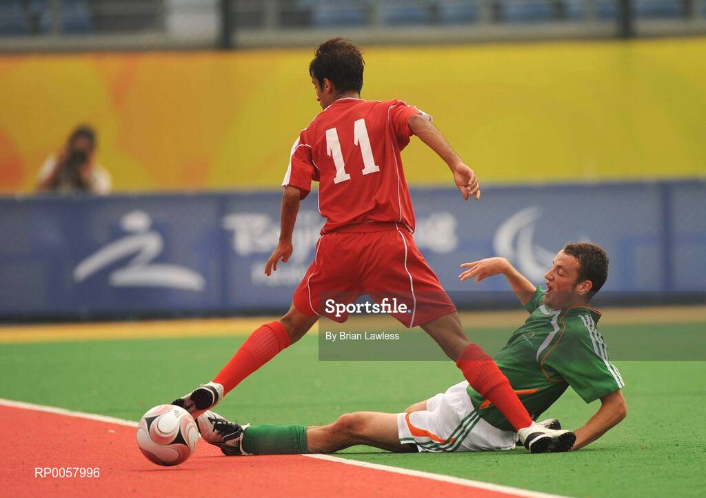 8 September 2008; Ireland's Gary Messett, from Bray, Co. Wicklow, in action against Rasoul Atashafrouz, Iran. Beijing Paralympic Games 2008, Ireland v Iran, 7-A-Side Soccer, First Round, Group B, Olympic Green Hockey Field A, Beijing, China. Picture credit: Brian Lawless / SPORTSFILE