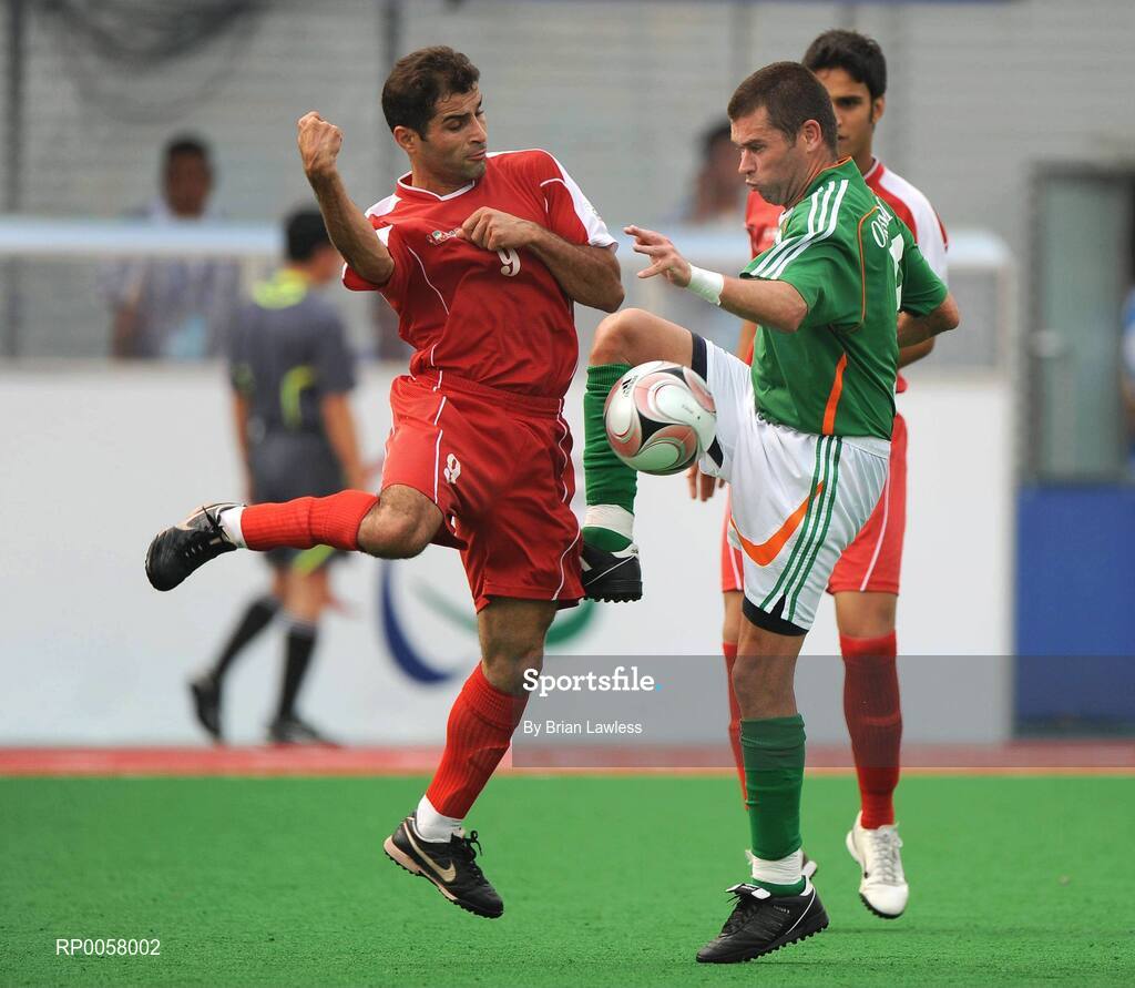 8 September 2008; Ireland's Finbarr O'Riordan, from Mitchelstown, Co. Cork, in action against Morteza Heidari, Iran. Beijing Paralympic Games 2008, Ireland v Iran, 7-A-Side Soccer, First Round, Group B, Olympic Green Hockey Field A, Beijing, China. Picture credit: Brian Lawless / SPORTSFILE