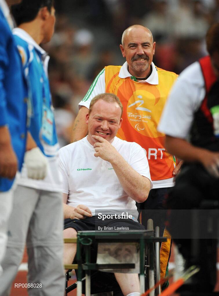 8 September 2008; Eoin Cleare, from Birr, Co. Offaly, in relaxed mood with Assistant Michael Bergin, from Wexford, before the Men's Shot Putt Final - F32. Eoin finished in 7th position overall with a distance of 6.11. Beijing Paralympic Games 2008, Men's Shot Putt Final F32, National Stadium, Olympic Green, Beijing, China. Picture credit: Brian Lawless / SPORTSFILE