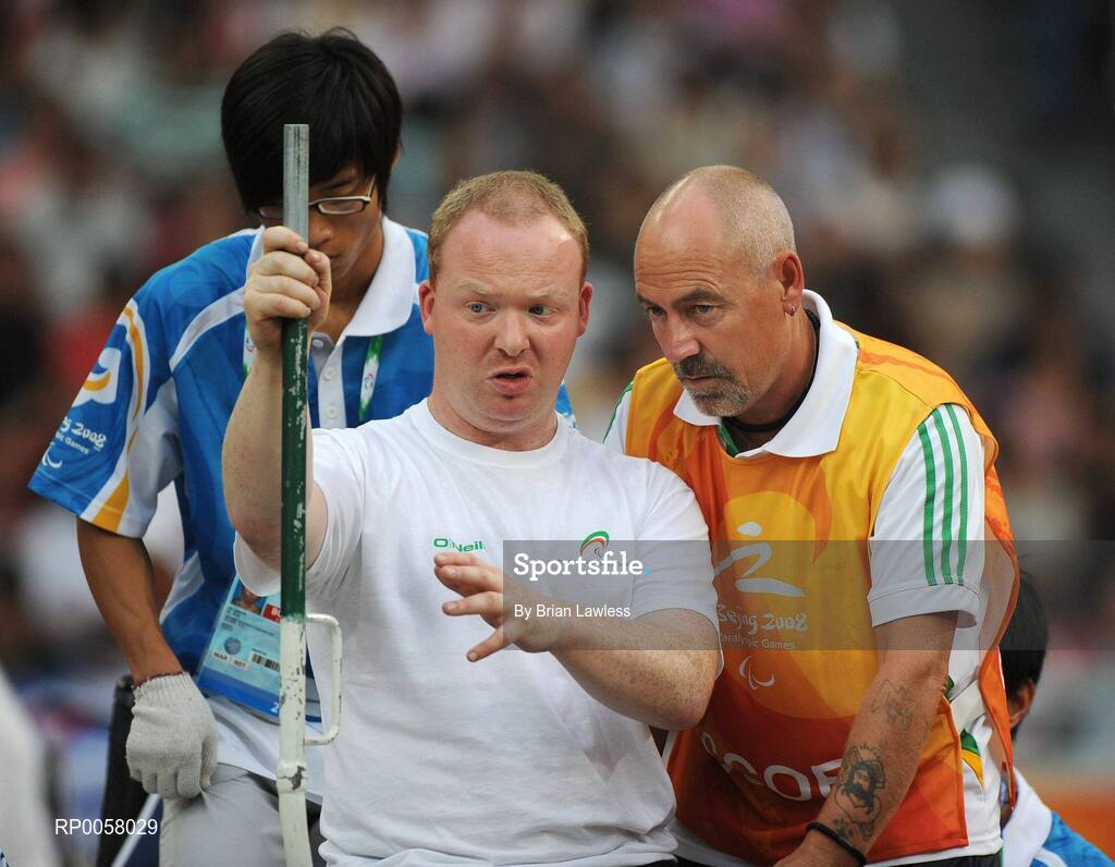 8 September 2008; Eoin Cleare, from Birr, Co. Offaly, consults Assistant Michael Bergin, from Wexford, during the Men's Shot Putt Final - F32. Eoin finished in 7th position overall with a distance of 6.11. Beijing Paralympic Games 2008, Men's Shot Putt Final F32, National Stadium, Olympic Green, Beijing, China. Picture credit: Brian Lawless / SPORTSFILE