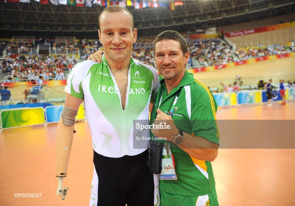 8 September 2008; Cathal Miller, from Artane, Dublin, with team manager Denis Toomey, from Mitchelstown, Cork, right, after the Men's 4km Individual Pursuit (LC1) Qualifier. Cathal finished 5th in a time of 4.53:969 setting a new Irish Record and personal best, smashing his existing record by over 7 seconds. Beijing Paralympic Games 2008, Men's 4km Individual Pursuit (LC1) Qualifier, Laoshan Velodrome, Shijingshan District, Beijing, China. Picture credit: Brian Lawless / SPORTSFILE