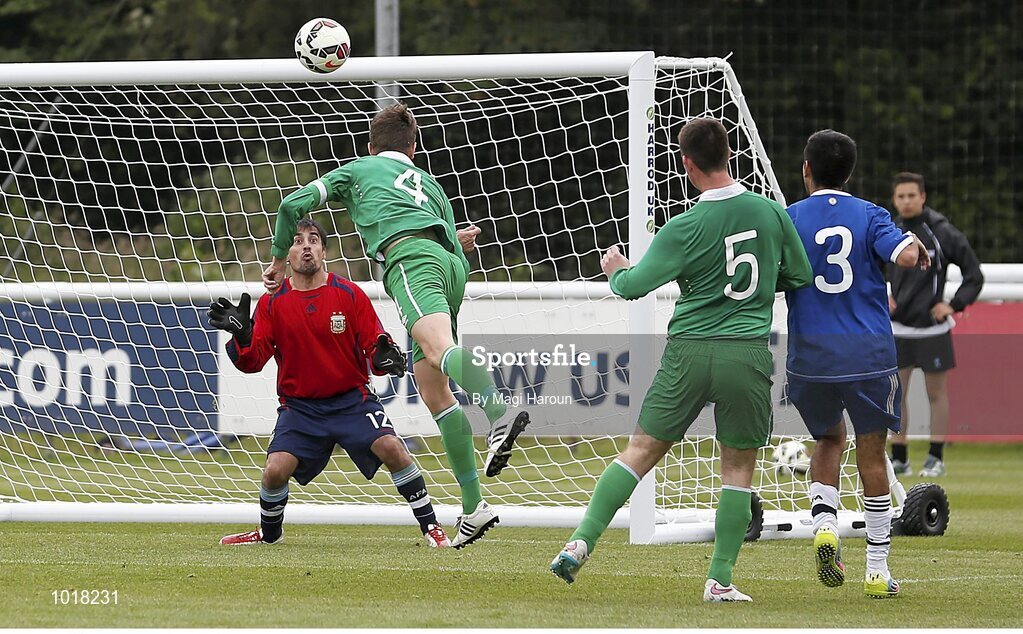 26 June 2015; Ireland's Luke Evans heads his side's winning goal past Argentina goalkeeper Gustavo Nahuelquin. This tournament is the only chance the Irish team have to secure a precious qualifying spot for the 2016 Rio Paralympic Games. 2015 CP Football World Championships, Ireland v Argentina, St. George’s Park, Tatenhill, Burton-upon-Trent, Staffordshire, England. Picture credit: Magi Haroun / SPORTSFILE