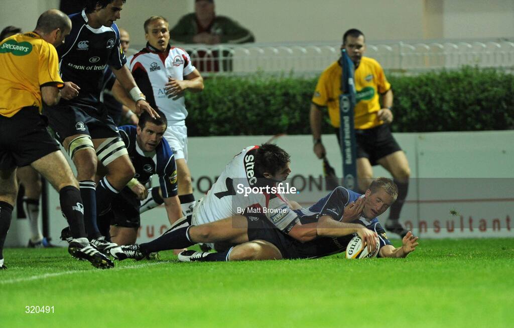 12 September 2008; Luke Fitzgerald, Leinster, goes over for his third try against Edinburgh despite the tackle from Allister Hogg. Magners League, Leinster v Edinburgh, RDS, Ballsbridge, Dublin.  Picture credit: Matt Browne / SPORTSFILE