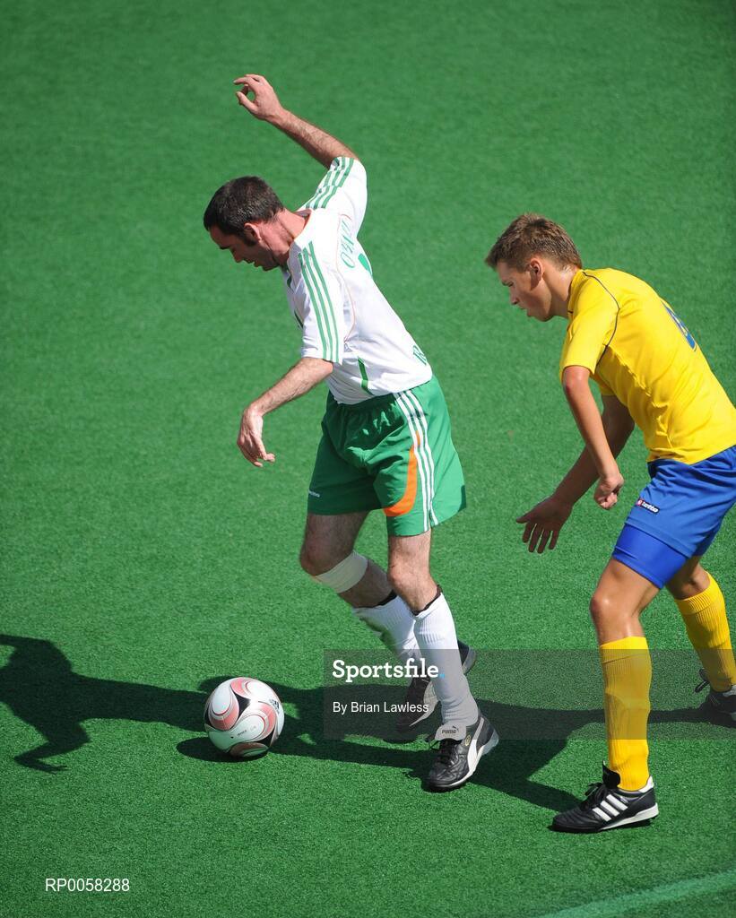 10 September 2008; Alan O'Hara, Ireland, in action against Ivan Shkvarlo, Ukraine. Ireland lost their match 7-0 and will face Great Britain in their final group match this coming Friday the 12th. Beijing Paralympic Games 2008, Ireland v Ukraine, 7-A-Side Soccer, First Round, Group B, Match 6, Olympic Green Hockey Field A, Beijing, China. Picture credit: Brian Lawless / SPORTSFILE