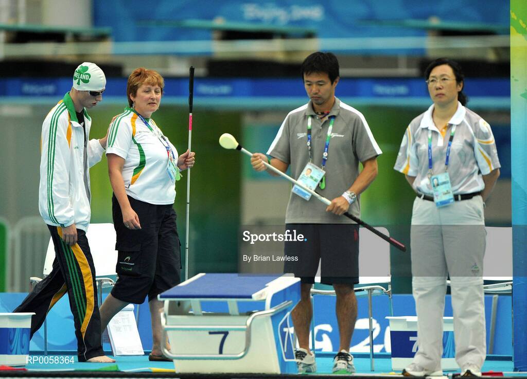 11 September 2008; Ireland's Stephen Campbell, from Cookstown, Tyrone, is lead to the pool by Swimming manager Geraldine Conway for the Men's 400m Freestyle - S11 heats. Stephen set a new Irish record with a time of 5:28.43 beating his PB by over 6 seconds. Beijing Paralympic Games 2008, Men's 400m Freestyle - S11, Heat 2, National Aquatic Centre, Olympic Green, Beijing, China. Picture credit: Brian Lawless / SPORTSFILE