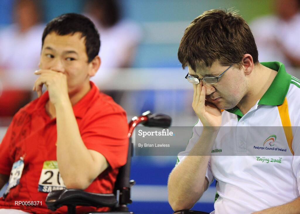 11 September 2008; Ireland's Padraic Moran, from Bray, Wicklow, reacts at the end of the match, as China's Fei Cao looks on, during the Mixed Team BC1-2 Quarter Final match. The Irish team exited the tournament at the hands of the Chinese with a final score of 12-2. Beijing Paralympic Games 2008, Mixed Team BC1-2,  Quarter Final, Ireland v China, Fencing Hall of National Convention Centre, Olympic Green, Beijing, China. Picture credit: Brian Lawless / SPORTSFILE