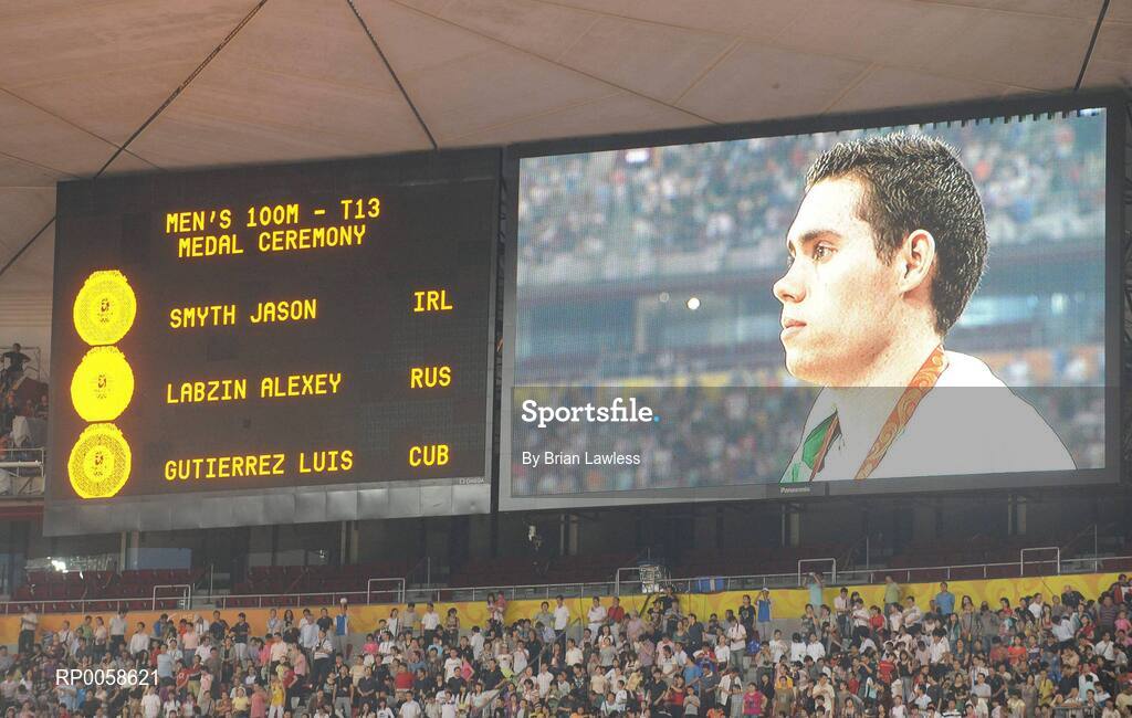 13 September 2008; The scoreboard shows Ireland's Jason Smyth, from Eglington, Co. Derry, on the podium after he won Gold in the Men's 100m T13 Final and set a new world and paralympic record in a time of 10.62, beating his own world record of 10.81 which he set in this mornings heats. Beijing Paralympic Games 2008, Men's 100m T13 Final, National Stadium, Olympic Green, Beijing, China. Picture credit: Brian Lawless / SPORTSFILE