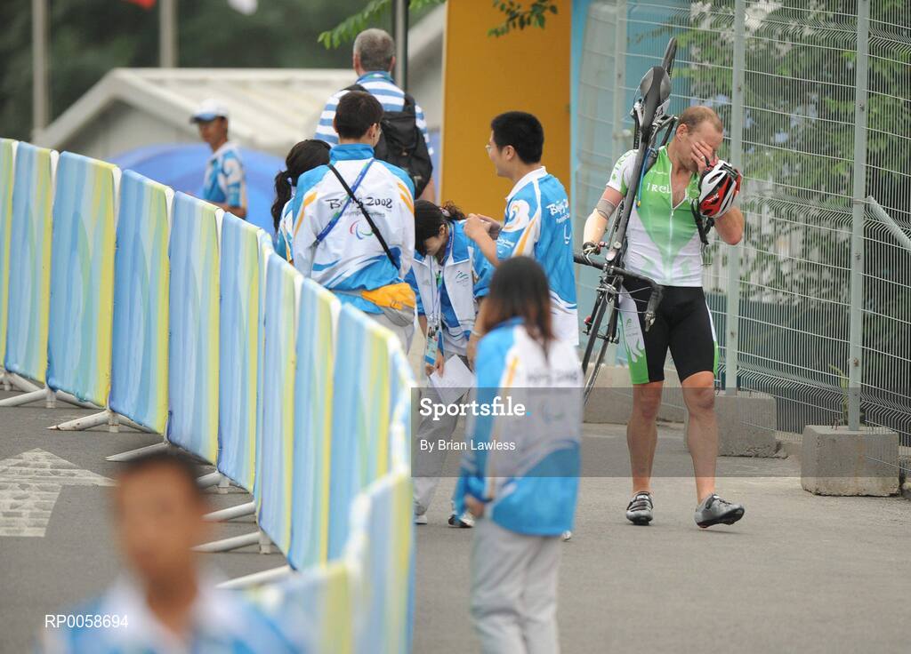 13 September 2008; Ireland's Cathal Miller, after he was forced to pull out of the Men's Road Race - LC1 / 2 / CP4 over a distance of 72.6km. Miller's race was ended by a punctured back tyre on the 3rd lap as he was sitting comfortably in the leading pack. Beijing Paralympic Games 2008, Men's Road Race - LC1 / 2 / CP4, Road Cycling Course, Ming Tombs Reservoir, Beijing, China. Picture credit: Brian Lawless / SPORTSFILE