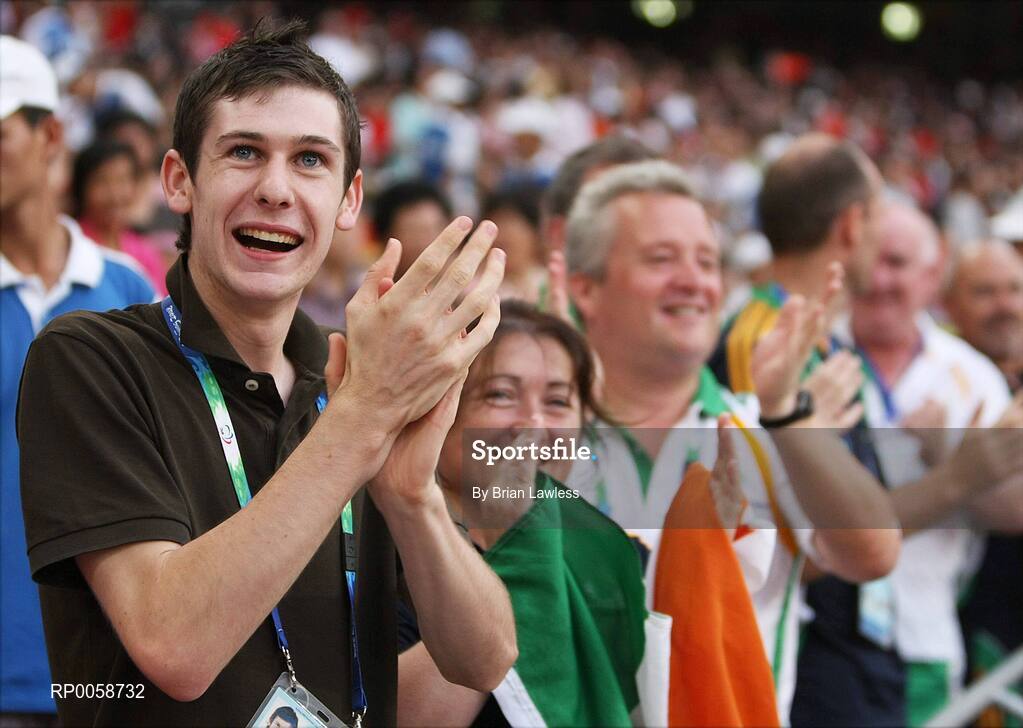 13 September 2008; Ireland's 800m Gold medalist Michael Mckillop applauds team-mate Jason Smyth, from Eglinton, Co. Derry, as he crosses the finish line in the Men's 100m T13 Final to win Gold and set a new world and paralympic record in a time of 10.62, beating his own world record of 10.81 which he set in this morning's heats. Beijing Paralympic Games 2008, Men's 100m T13 Final, National Stadium, Olympic Green, Beijing, China. Picture credit: Brian Lawless / SPORTSFILE