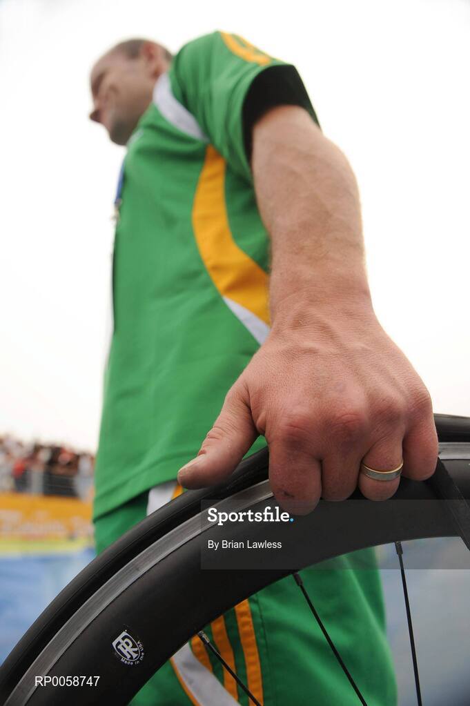 13 September 2008; Ireland's Cathal Miller, from Artane, Dublin, holds a bicycle wheel after the Men's Road Race - LC1 / 2 / CP4 over a distance of 72.6km. Miller's race was ended by a punctured back tyre on the 3rd lap as he was sitting comfortably in the leading pack. Beijing Paralympic Games 2008, Men's Road Race - LC1 / 2 / CP4, Road Cycling Course, Ming Tombs Reservoir, Beijing, China. Picture credit: Brian Lawless / SPORTSFILE