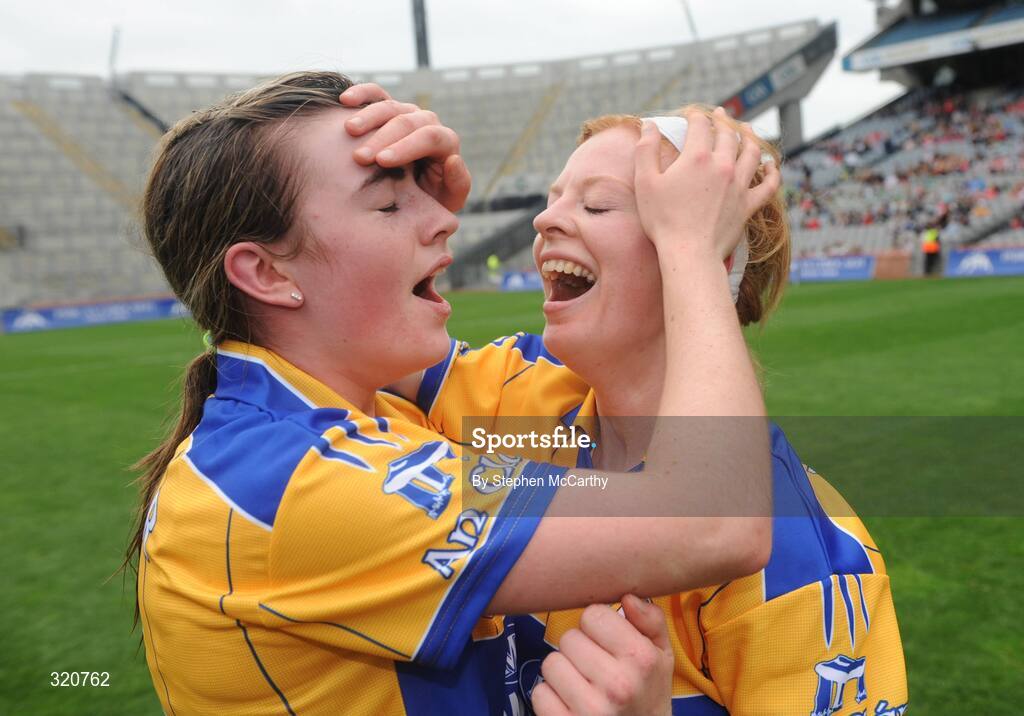 14 September 2008; Clare players Kate Lynch, left, and captain Deidre Murphy celebrate after the match. Gala All-Ireland Junior Camogie Championship Final, Clare v Offaly, Croke Park, Dublin. Picture credit: Stephen McCarthy / SPORTSFILE