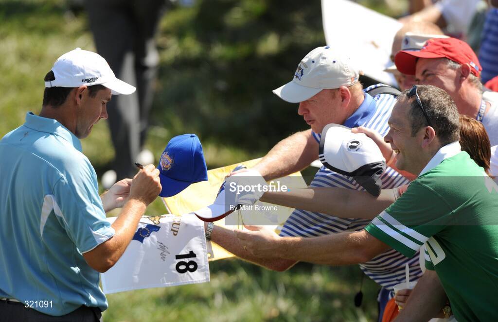 18 September 2008; Jim Fagan, fron Newry, Co. Armagh, has his hat signed by Padraig Harrington, Team Europe 2008, during the final day of practice. 37th Ryder Cup, Valhalla Golf Club, Louisville, Kentucky, USA. Picture credit: Matt Browne / SPORTSFILE