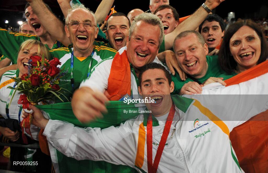 16 September 2008; Ireland's Jason Smyth, from Eglinton, Co. Derry, celebrates with from left, Assistant Paralympic Performance Director Nancy Chillingworth, 800m T37 gold medalist Michael McKillop, Chef de Mission Jimmy Byrne, Paralympic Performance Director, Liam Harbison, Team Physiologist Bruce Wardrop, Ambulant Track Coach Stephen Maguire, Ben Kilgore, Smyth's father Lloyd, brother Justyn and mother Diane after the Men's 200m -T13 Final. Smyth won his second gold of these Paralympic games in a World record time of 21.43 seconds, his first coming in the Men's 100m T13 Final also in a world record time of 10.62. Beijing Paralympic Games 2008, Men's 200m -T13, Final, National Stadium, Olympic Green, Beijing, China. Picture credit: Brian Lawless / SPORTSFILE