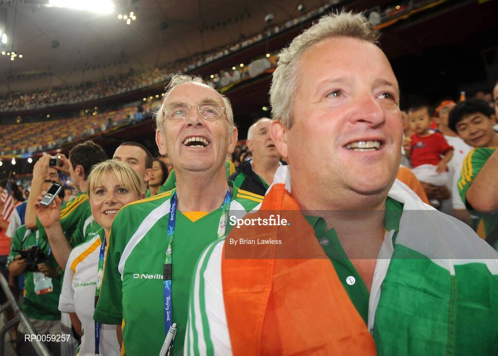 16 September 2008; Chef de Mission Jimmy Byrne, from Killester, Dublin,  Assistant Paralympic Performance Director Nancy Chillingworth, from Mornington, Meath and Ambulant Track Coach Stephen Maguire, from Strabane, Tyrone, sing the National Anthem after Jason Smyth had won the Men's 200m -T13 Final. Smyth won his second gold of these Paralympic games in a World record time of 21.43 seconds, his first coming in the Men's 100m T13 Final also in a world record time of 10.62. Beijing Paralympic Games 2008, Men's 200m -T13, Final, National Stadium, Olympic Green, Beijing, China. Picture credit: Brian Lawless / SPORTSFILE