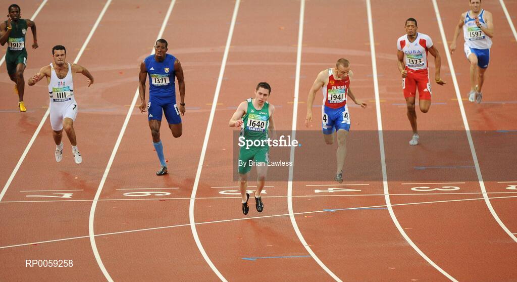 16 September 2008; Ireland's Jason Smyth, from Eglinton, Co. Derry, crosses the finish to win the Men's 200m -T13 Final ahead of, from left, Jonathan Ntutu, South Africa, Vugar Mehdiyev, Azerbaijan, Luis Manuel Galano, Cuba, Alexey Labzin, Russia, Luis Felipe Gutierrez, Cuba, and Loannis Protos, Greece. Smyth won his second gold of these Paralympic games in a World record time of 21.43 seconds, his first coming in the Men's 100m T13 Final also in a world record time of 10.62. Beijing Paralympic Games 2008, Men's 200m -T13, Final, National Stadium, Olympic Green, Beijing, China. Picture credit: Brian Lawless / SPORTSFILE