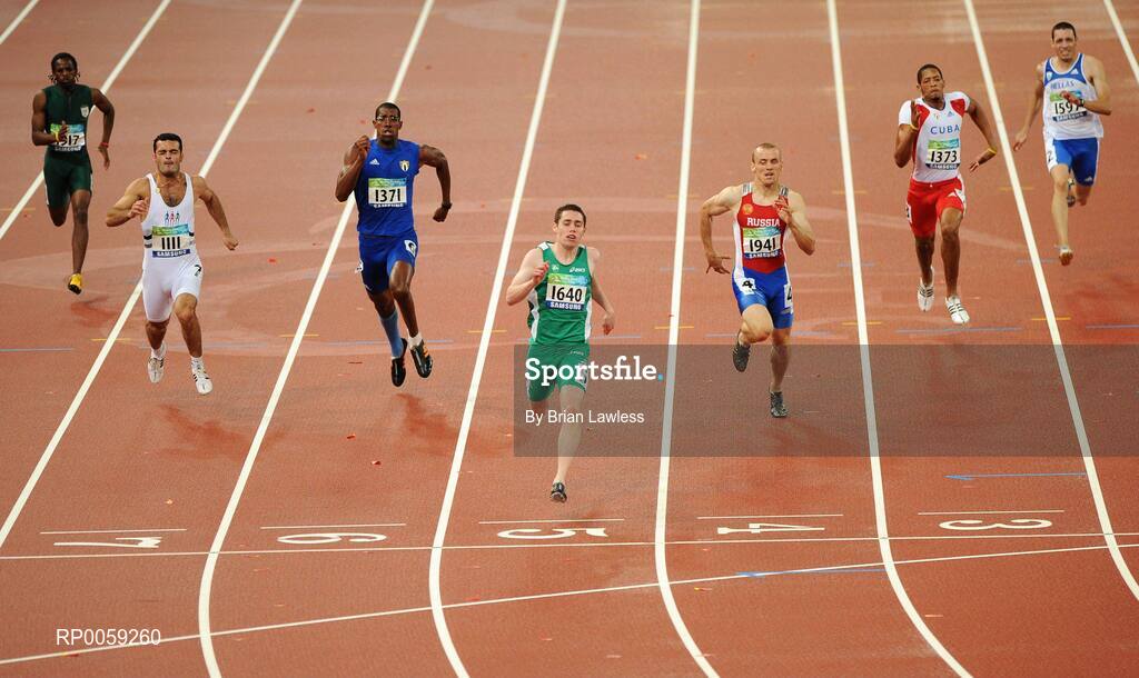 16 September 2008; Ireland's Jason Smyth, from Eglinton, Co. Derry, crosses the finish to win the Men's 200m -T13 Final ahead of, from left, Jonathan Ntutu, South Africa, Vugar Mehdiyev, Azerbaijan, Luis Manuel Galano, Cuba, Alexey Labzin, Russia, Luis Felipe Gutierrez, Cuba, and Loannis Protos, Greece. Smyth won his second gold of these Paralympic games in a World record time of 21.43 seconds, his first coming in the Men's 100m T13 Final also in a world record time of 10.62. Beijing Paralympic Games 2008, Men's 200m -T13, Final, National Stadium, Olympic Green, Beijing, China. Picture credit: Brian Lawless / SPORTSFILE
